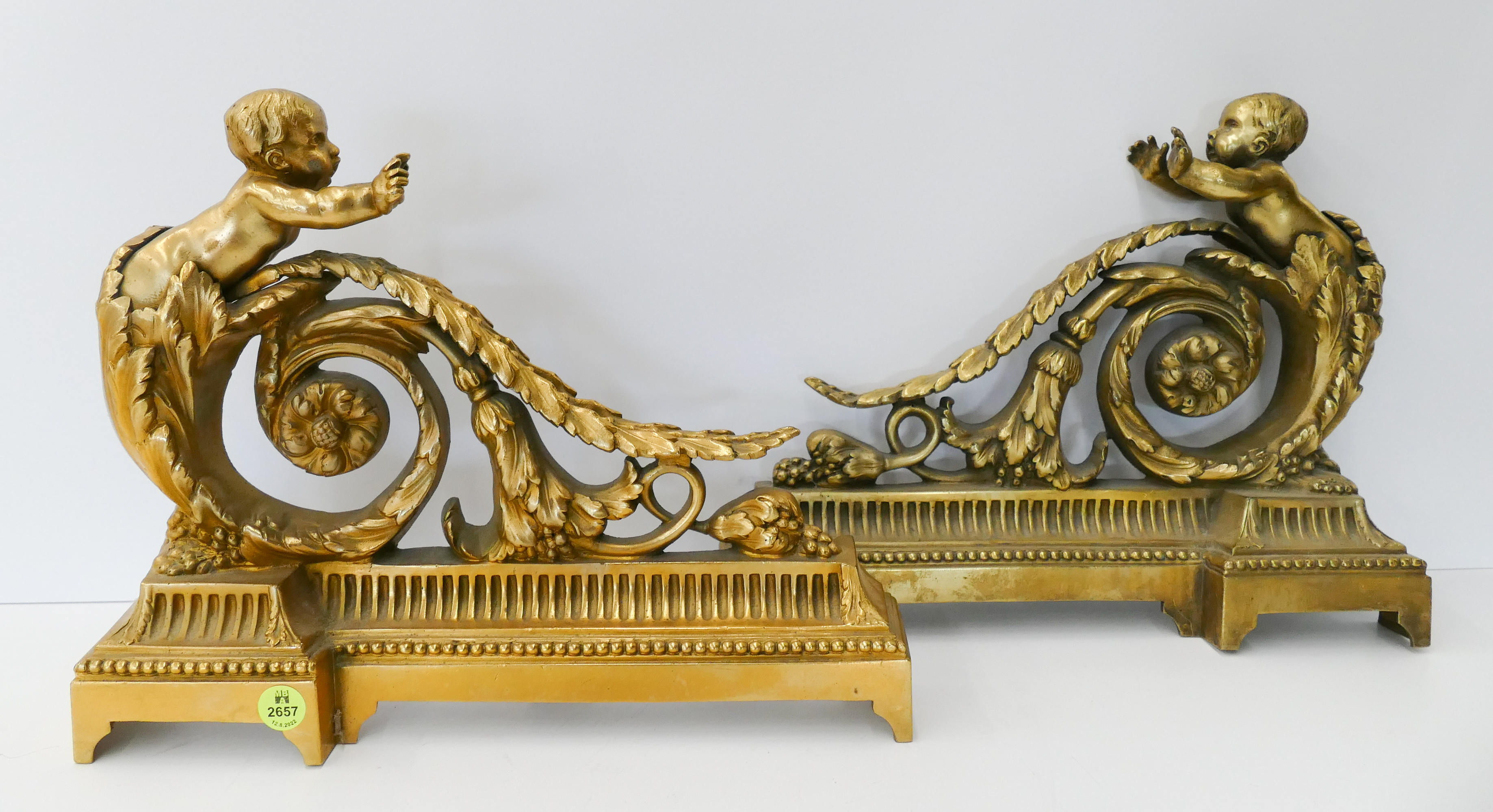 Appraisal: Pair French Gilt Bronze Fire Fender Pieces with Putti ''