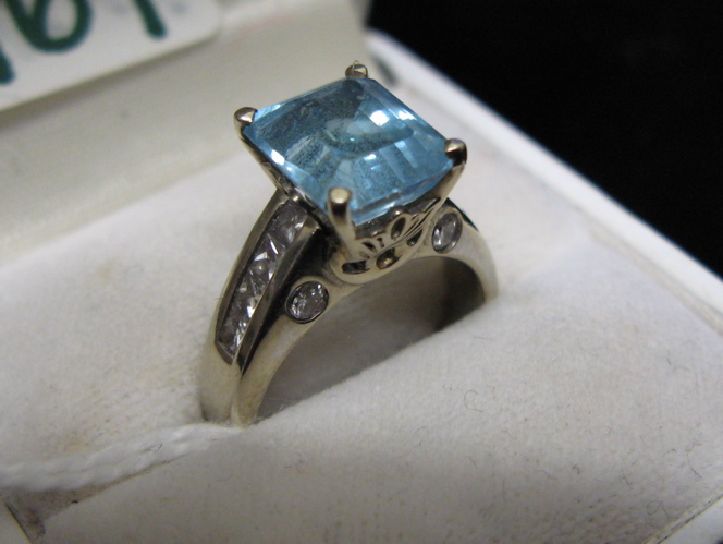 Appraisal: TOPAZ DIAMOND AND FOURTEEN KARAT WHITE GOLD RING centering a