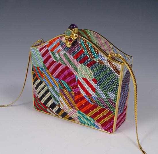 Appraisal: JUDITH LEIBER MULTICOLOR PURSE Many color crystals on gold tone