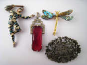 Appraisal: A mixed lot of costume jewellery comprising a cherub brooch