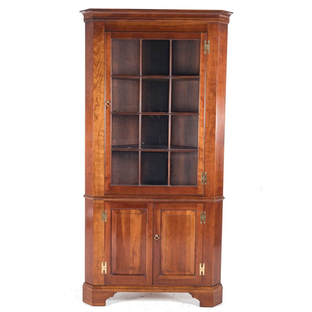 Appraisal: Henkel Harris Federal style cherry corner cabinet th century flat