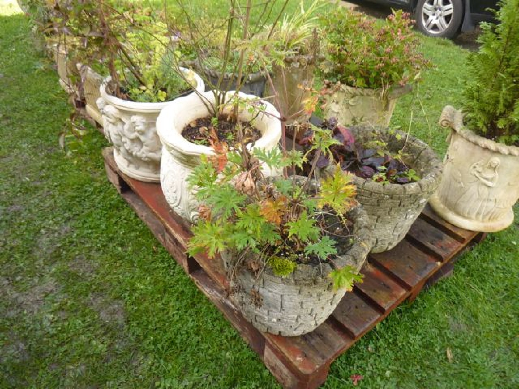 Appraisal: A cast composition stone garden planter of circular form with