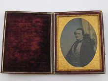 Appraisal: A Victorian photograph in traveling gilt metal and leather frame