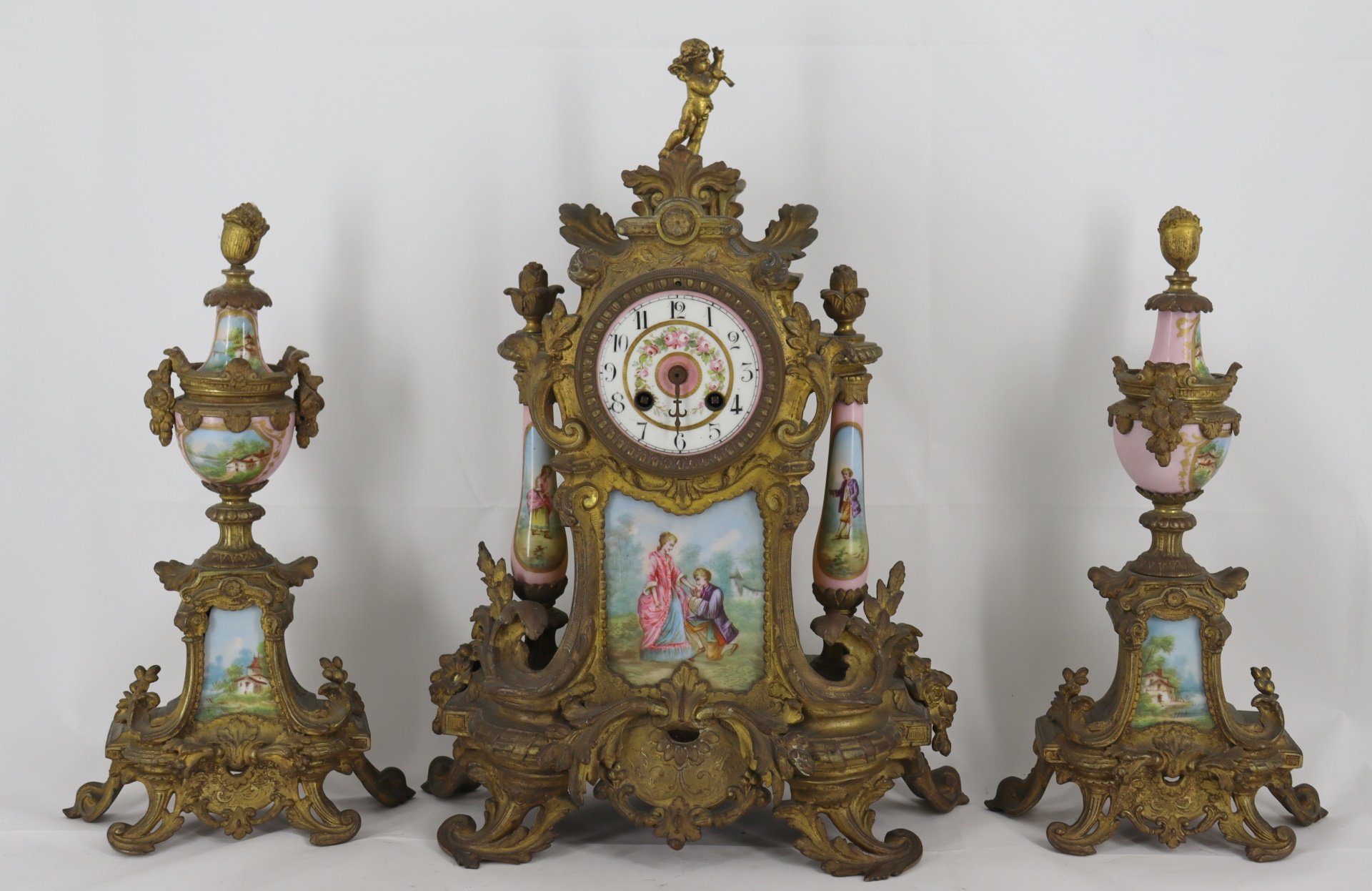 Appraisal: Antique Bronze Clock Garniture Set With Porcelain Inserts In the