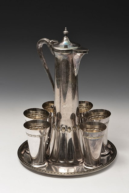 Appraisal: WMF Art Nouveau drinks set circa - comprising claret jug