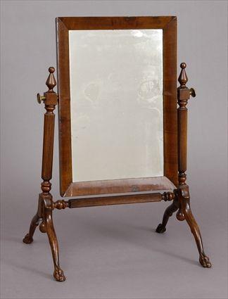 Appraisal: CHIPPENDALE-STYLE CARVED MAHOGANY DRESSING MIRROR The rectangular swing plate on