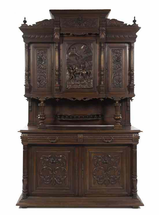 Appraisal: A Renaissance Revival Style Carved Cupboard in three parts the