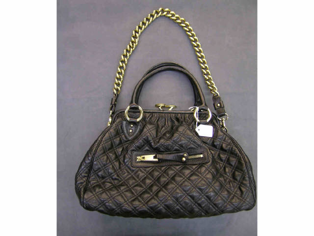 Appraisal: Black quilted leather Marc Jacobs handbag with clutch clasp double