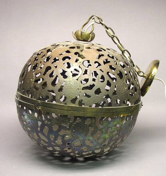 Appraisal: A Japanese pieced and reticulated metal spherical lantern With chrysanthemum