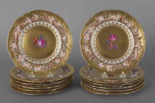 Appraisal: Set of twelve Capo di Monte plates with relief putti