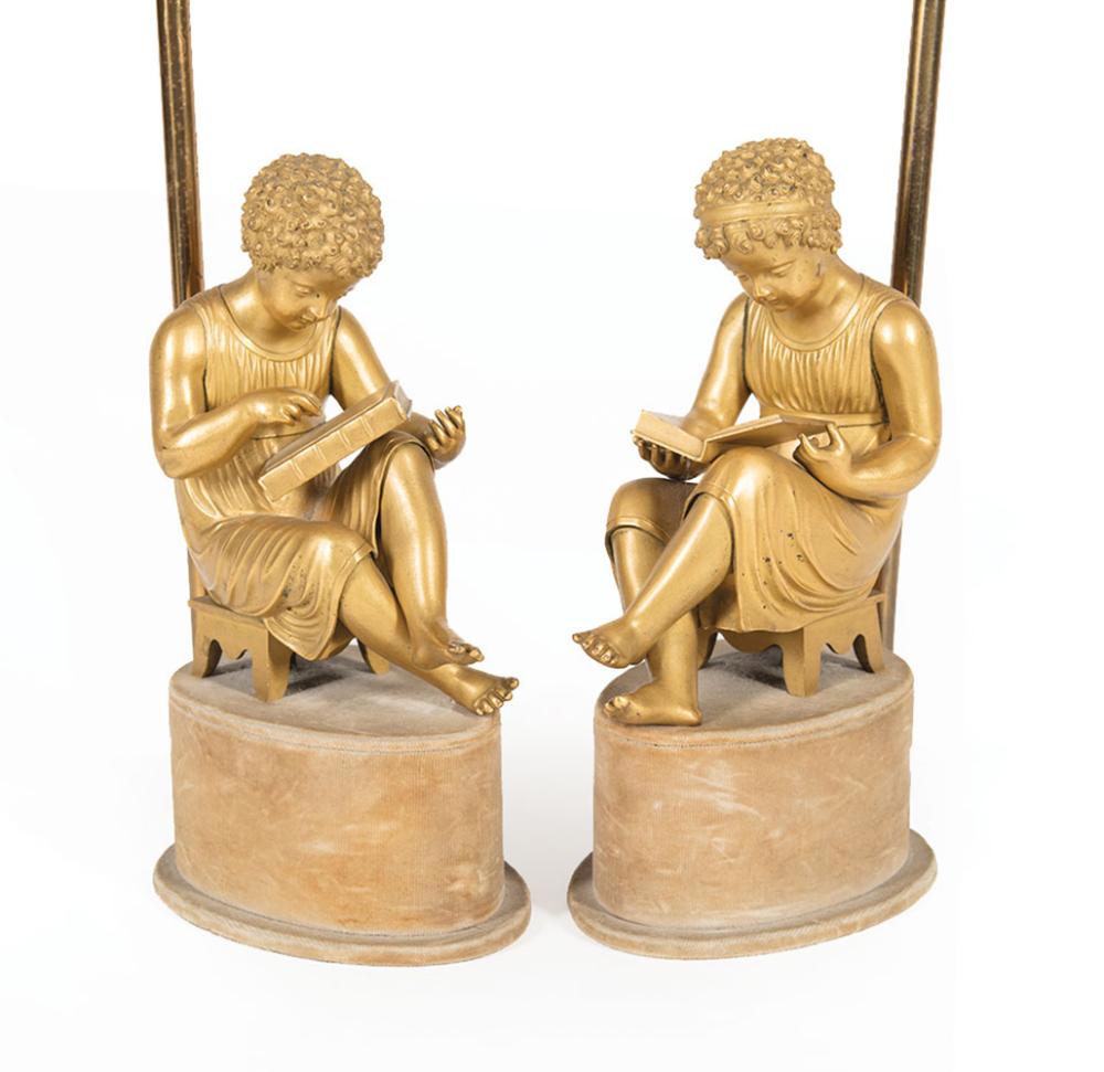 Appraisal: Pair of Continental Gilt Bronze Figural Lamps c modeled as