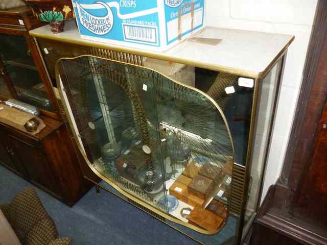 Appraisal: A MID TH CENTURY ITALIAN DISPLAY CABINET the formica top