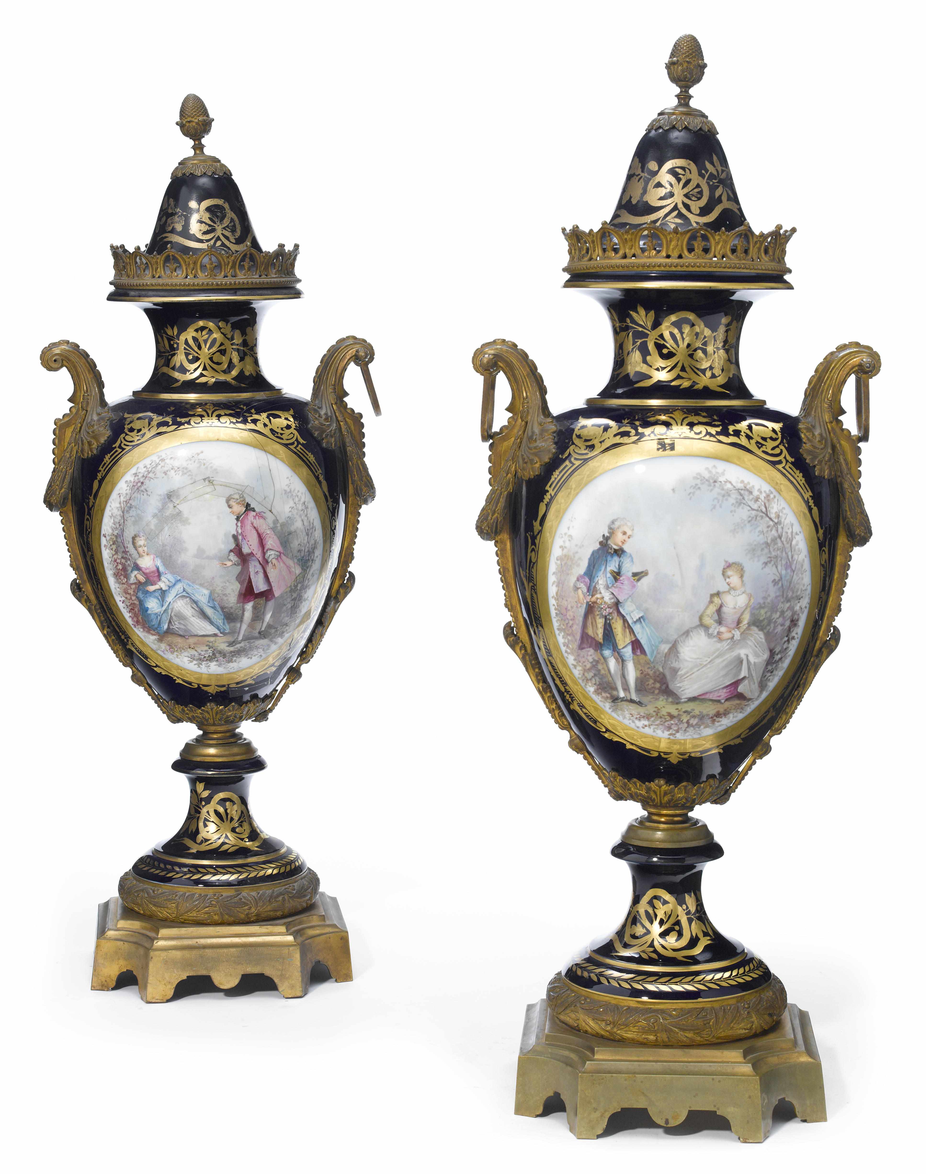 Appraisal: An imposing pair of Svres style porcelain and gilt bronze