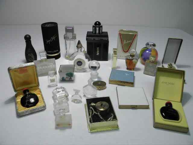 Appraisal: Collection of various assorted perfume bottles Includes pieces total Some