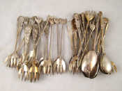 Appraisal: A set of six pairs of spoons and forks marked