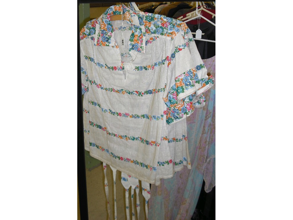 Appraisal: Group of floral printed blouses to include a red poplin