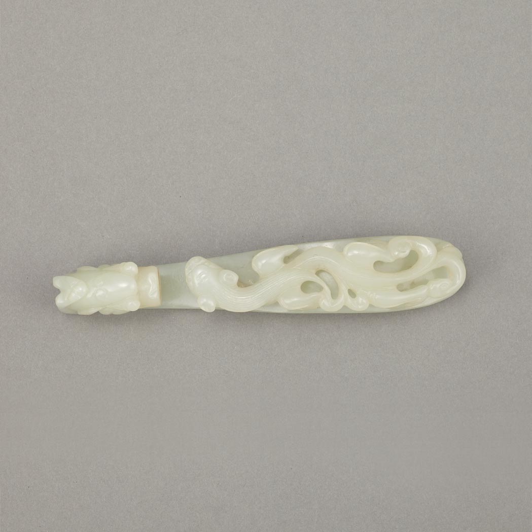 Appraisal: Chinese White Jade Buckle Carved in relief with a dragon's