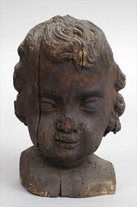 Appraisal: ITALIAN BAROQUE CARVED WOOD HEAD OF THE BABY JESUS Facing