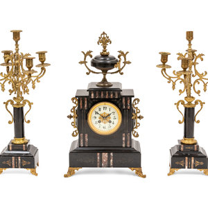 Appraisal: A Continental Three-Piece Garniture Circa comprising of a mantel clock