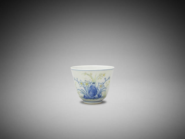 Appraisal: A Chinese doucai 'narcissus' wine cup Tongzhi six-character underglaze blue