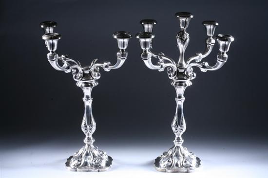 Appraisal: PAIR CONTINENTAL SILVER FIVE-LIGHT CONVERTIBLE CANDELABRA late th century Shaped