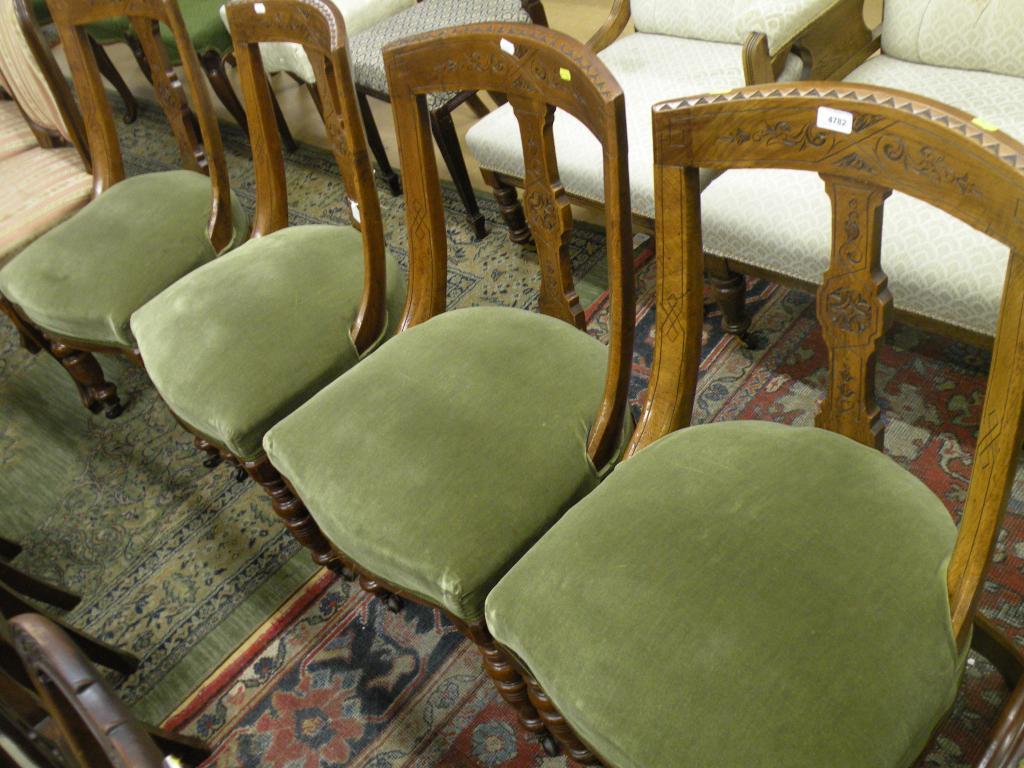 Appraisal: A set of four Victorian oak spoonback type chairs each