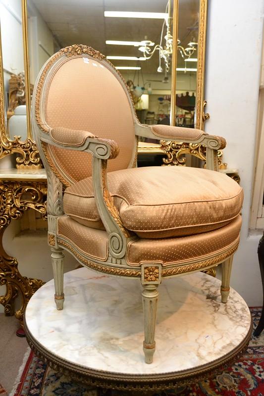 Appraisal: A SET OF FOUR LOUIS XVI STYLE ARMCHAIRS IN CHAMPAGNE