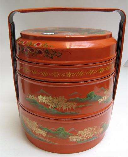 Appraisal: CHINESE LACQUER FOUR-STACK FOOD BOX hand decorated with outdoor and