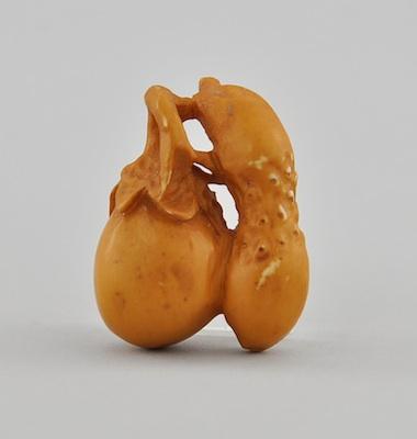 Appraisal: Double Gourd Signed Ivory Netsuke A carved elongated double gourd