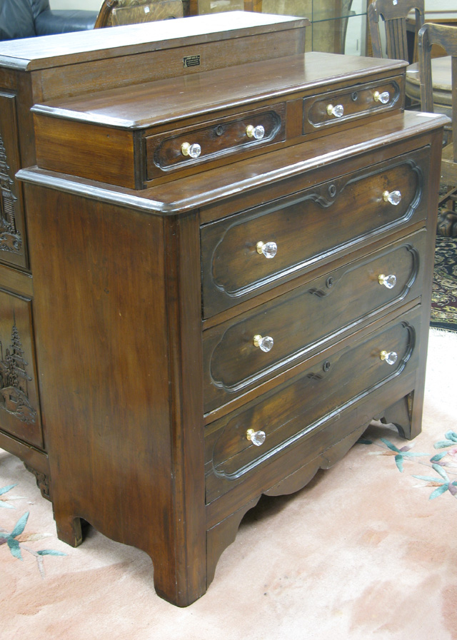 Appraisal: VICTORIAN WALNUT CHEST OF DRAWERS American last quarter of the