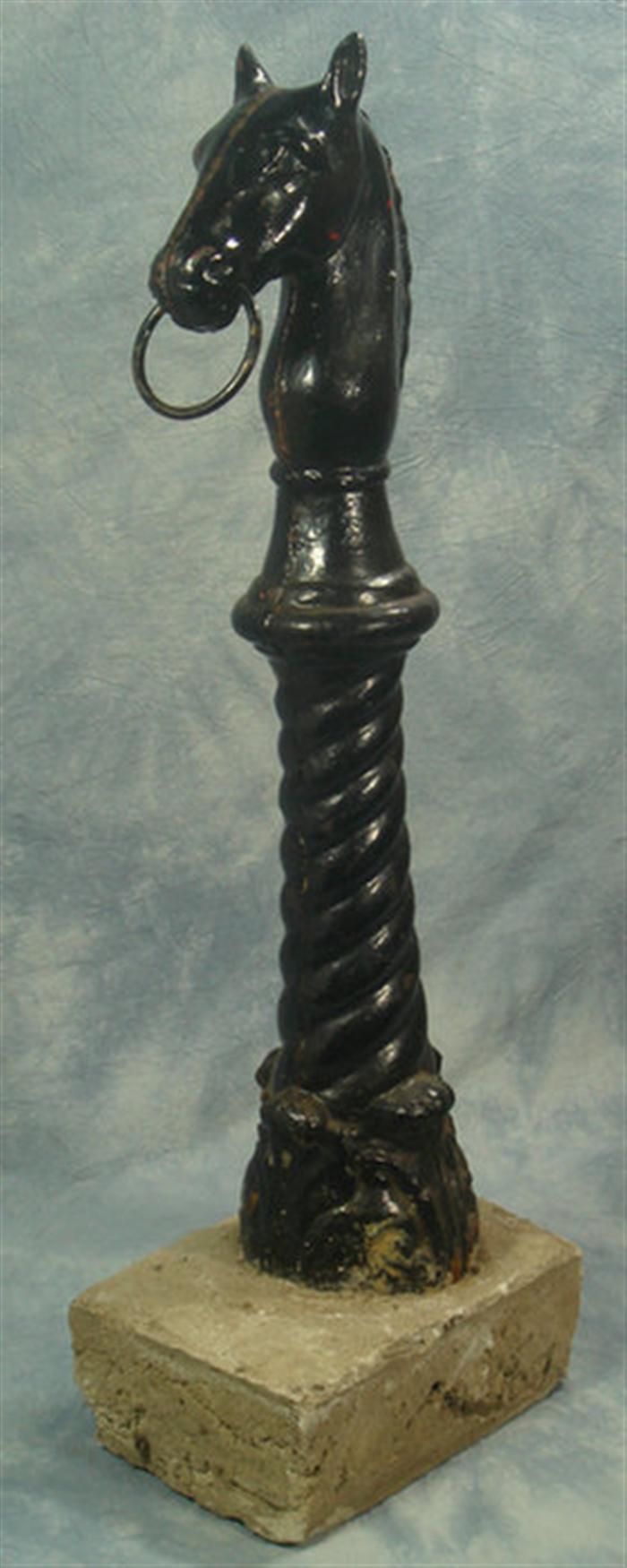 Appraisal: Cast iron horsehead hitching post h plus concrete base Estimate