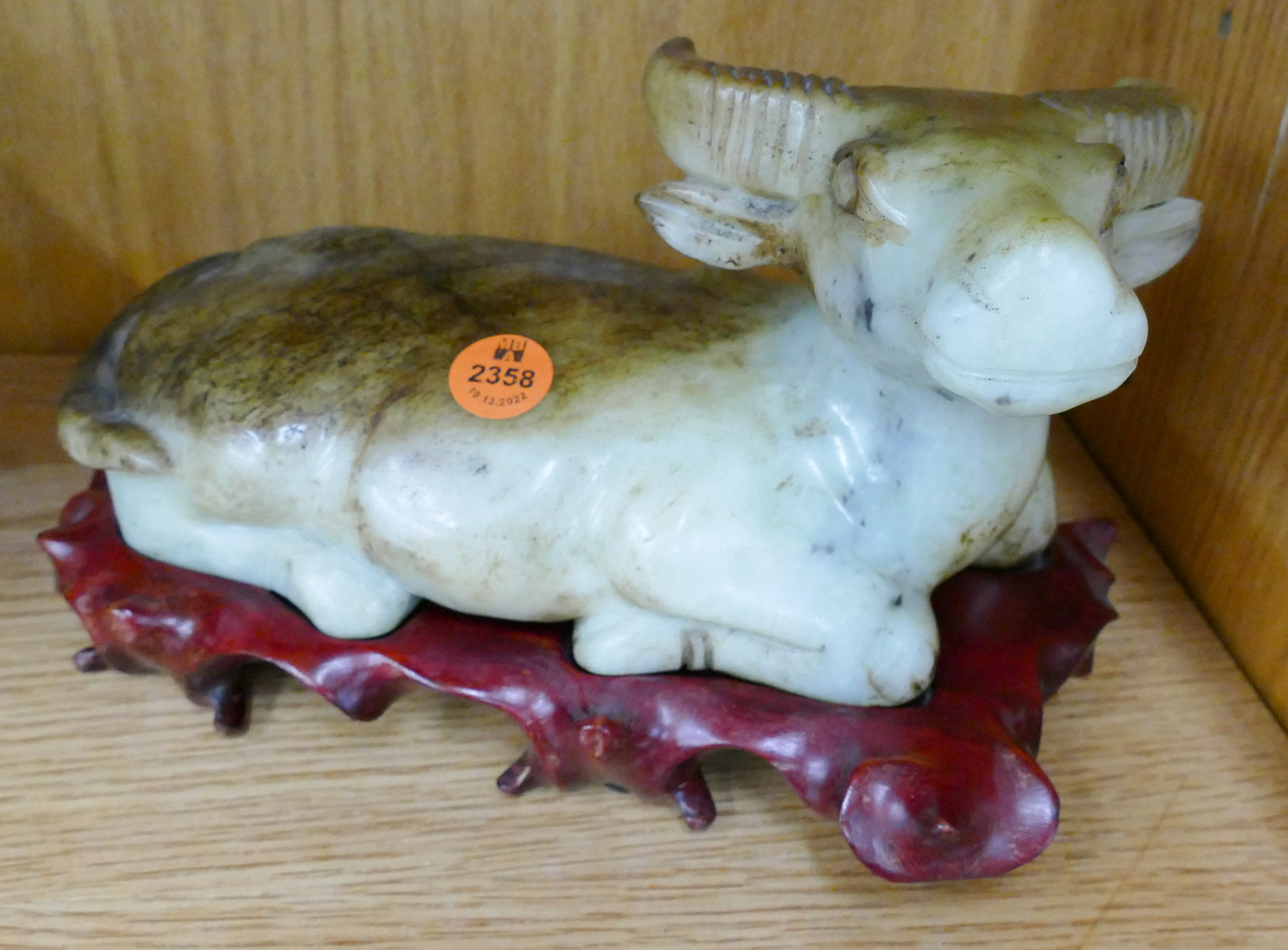 Appraisal: Chinese Large Jade Reclinning Ox Figure on Stand- ''