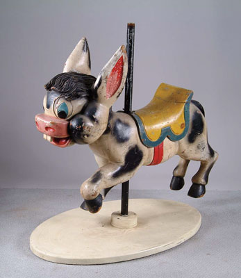 Appraisal: DONKEY CAROUSEL FIGURE Child size carved wooden figure of cartoon-esque