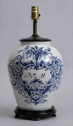 Appraisal: DUTCH DELFT BLUE AND WHITE APOTHECARY JAR MOUNTED AS A