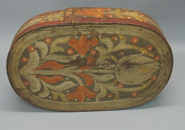 Appraisal: Covered box with boldly painted flowers orange with off-white leaves