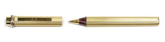 Appraisal: BALL-POINT PEN CARTIER Gold-plated Trois anneaux model Cylindrical ball-point pen