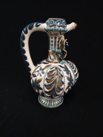 Appraisal: Hungarian Art Pottery Ewer Zsolnay or Fischer elaborate openwork trim