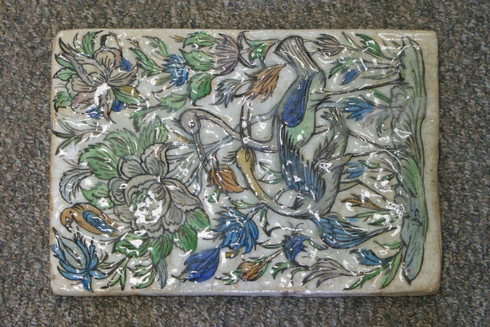 Appraisal: Continental glazed pottery tile depicting storks and other birds in