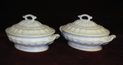 Appraisal: A pair of Ironstone covered tureensWith wheat relief decorations