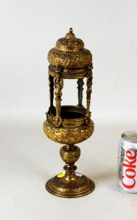 Appraisal: Early Continental Gilt Repousse Metal Oil Lamp Early Continental gilt