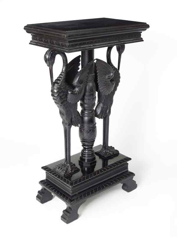 Appraisal: EBONIZED AESTHETIC MOVEMENT FIGURAL PEDESTAL TABLE Carved figural storks with