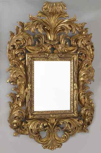 Appraisal: Italian Rococo style gilt wood mirrorhaving a highly carved and