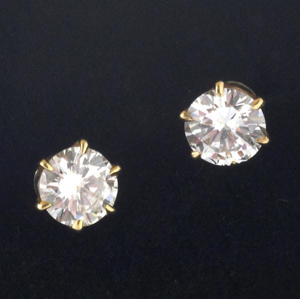 Appraisal: DIAMOND STUD EARRINGS k yg with fine brilliant cut diamonds