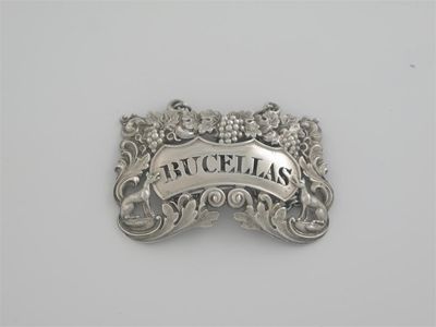 Appraisal: A William IV stamped openwork wine label with a border