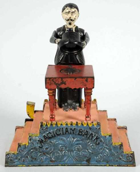 Appraisal: Cast Iron Magician Mechanical Bank Manufactured by J E Stevens