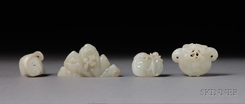 Appraisal: Four Jade Carvings China th th century a mountain-shaped brush