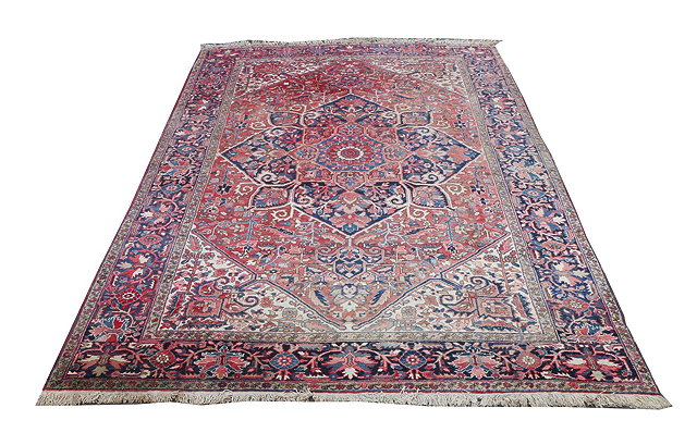 Appraisal: A LARGE OLD PERSIAN CARPET with all over foliate decoration