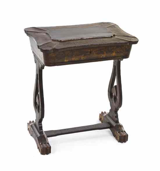 Appraisal: An English Lacquered Work Table having a shaped rectangular lift-top