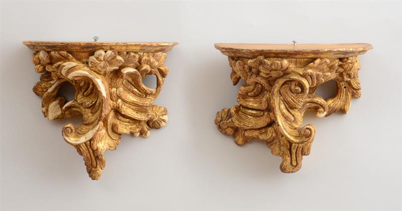 Appraisal: PAIR OF LOUIS XV STYLE CARVED GILTWOOD WALL BRACKETS Each