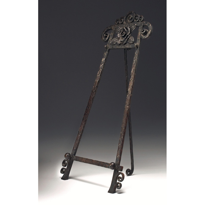 Appraisal: Arts Crafts easel wrought iron with a sculpted rose at